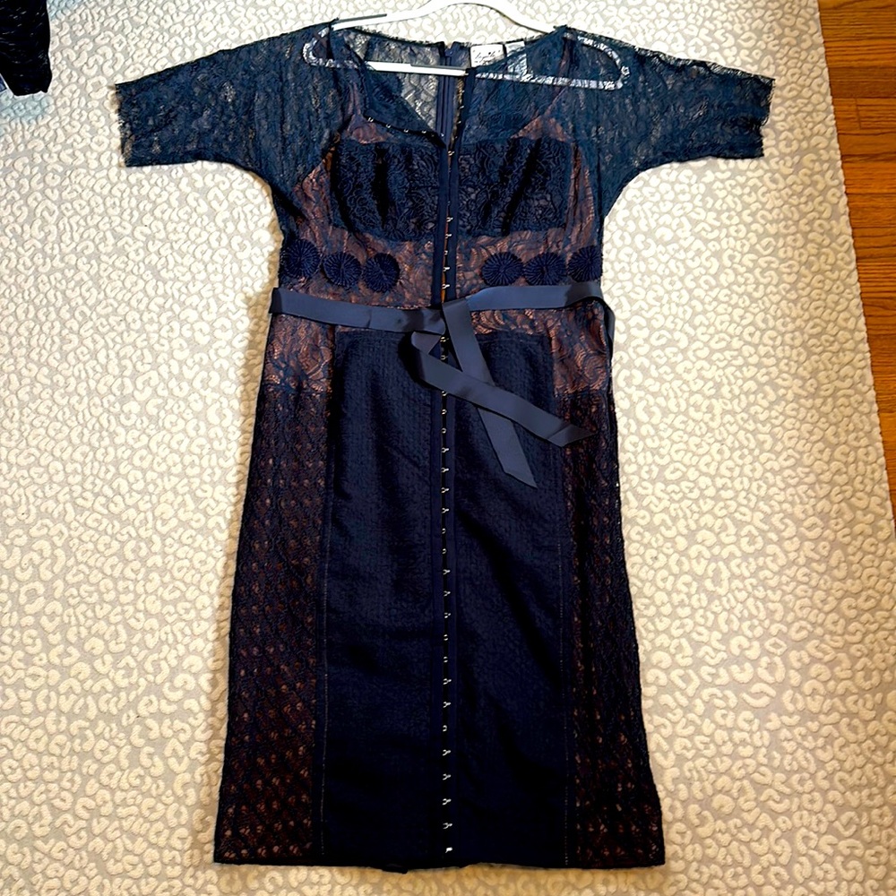 Anthropologie Navy lightly worn lace snug dress Very flattering